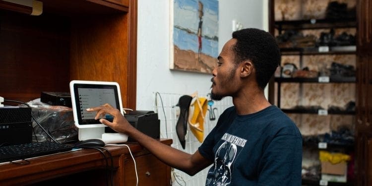 Shoemaker in Accra Ghana completes payment scaled
