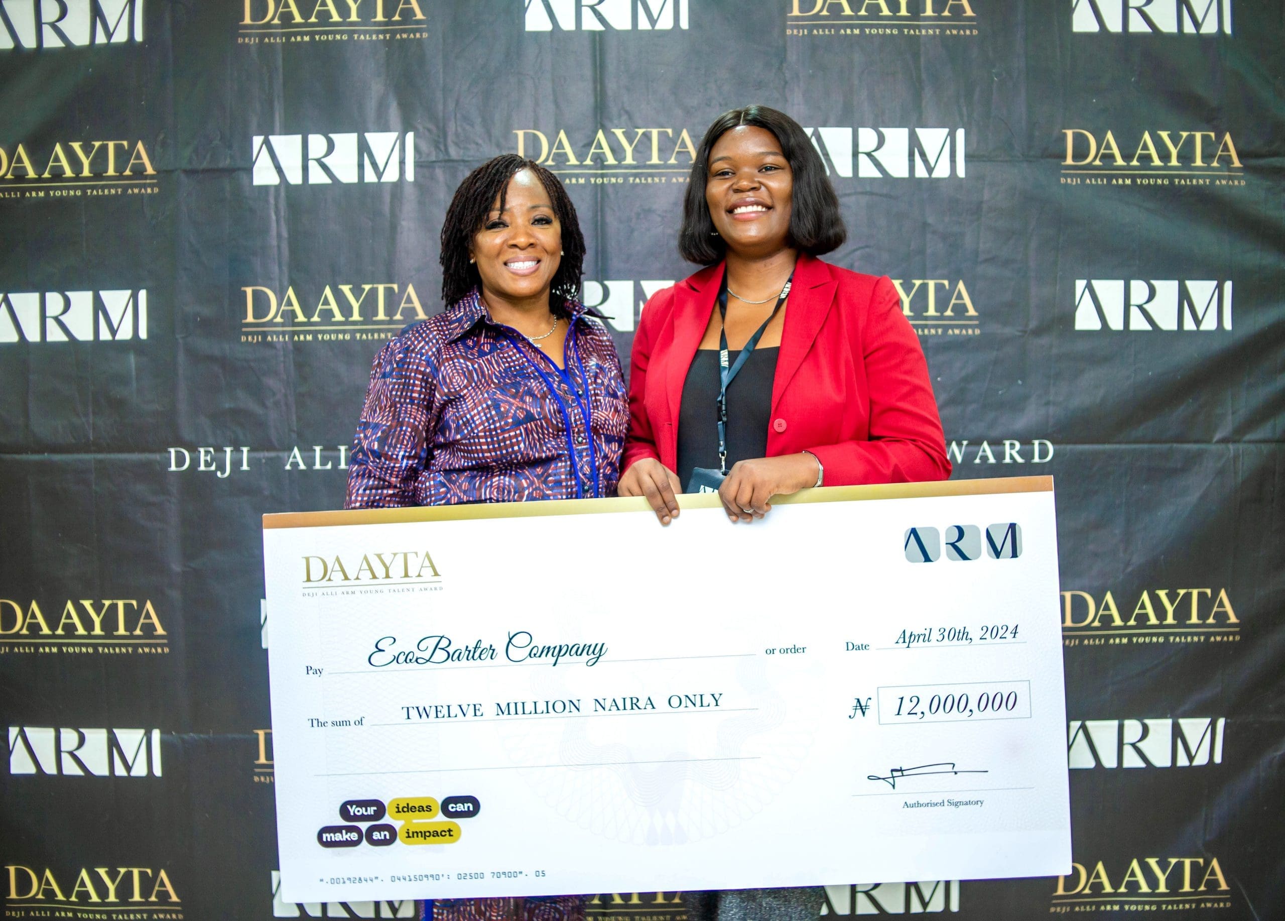 The winner of DAAYTA 2024 Rita Idehai of EcoBarter with Uche Azubuike MD of ARM Academy scaled